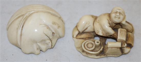 A Japanese ivory netsuke of a reclining man and an ivory mask, possibly Hotei, 19th/early 20th century, 3.9cm and 3.6cm